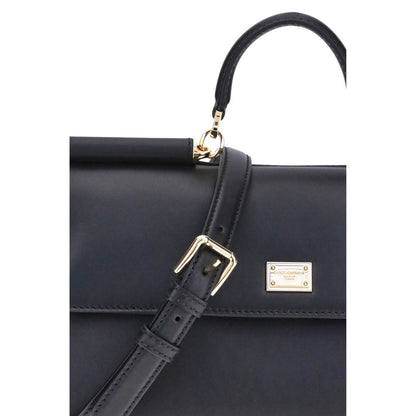 Flap Shoulder Bag by Dolce & Gabbana for women in bos taurus calf leather black & signature features a effortless chic silhouette with a secure flap & magnetic, ample single-compartment, and versatile shoulder-strap, handle & adjustable-strap for a effortless chic finish.