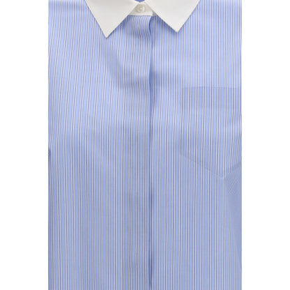 Shirt by Tory Burch for women in cotton blue, patterned & striped presents a discerning silhouette, showcasing a sophisticated and for a truly discerning finish.
