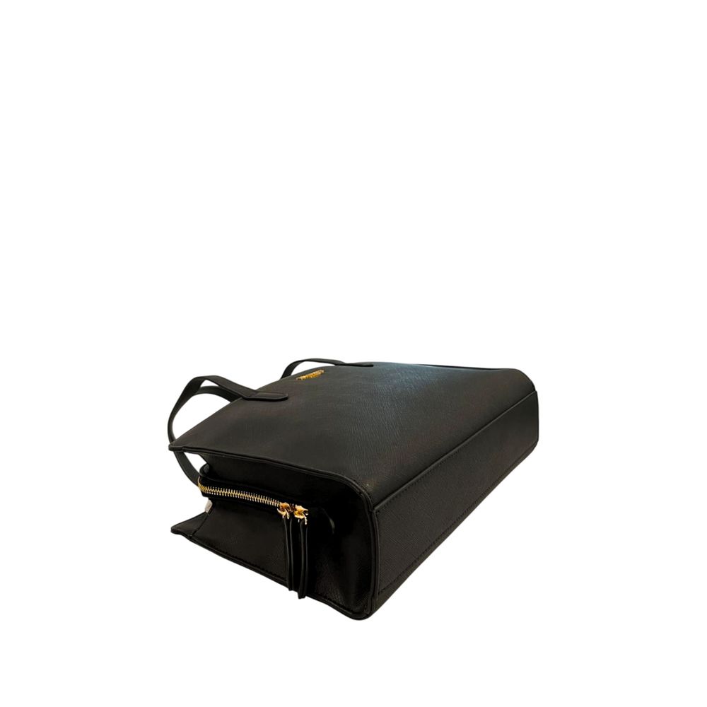 Shoulder Clutch Handbag by Twinset for women in polyurethane black & gold features a sculptural silhouette with a secure zipper, organized built-in-compartments, and versatile shoulder-strap & adjustable-strap for a sculptural finish.