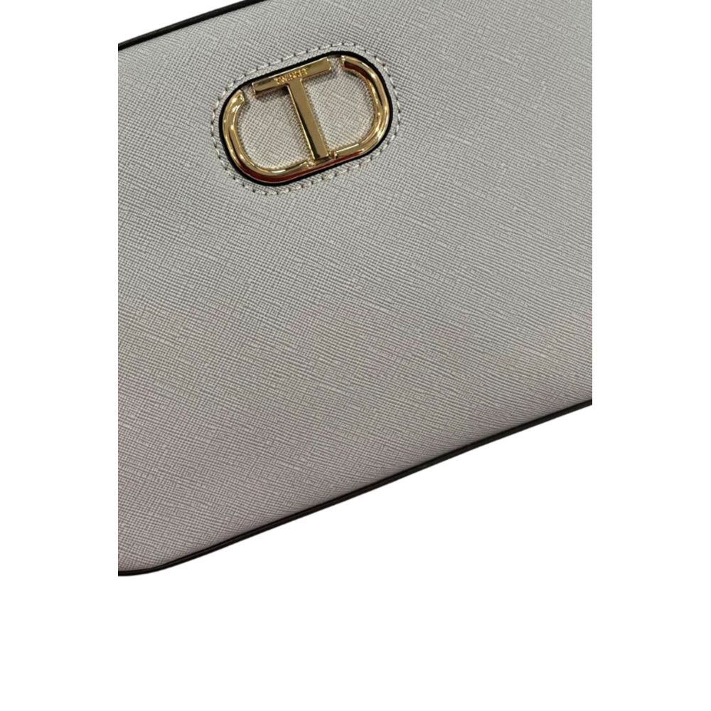 Crossbody Handbag by Twinset for women in polyurethane blue & gold features a versatile chic silhouette, meticulously detailed with a secure zipper, ample built-in-compartments, and versatile crossbody-strap, shoulder-strap & adjustable-strap.