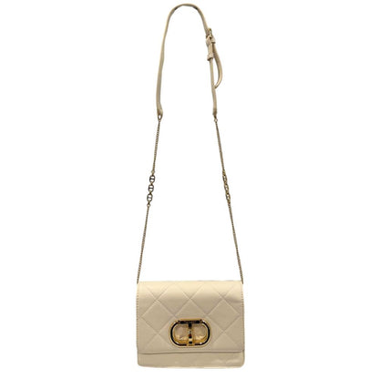 Mini 2-in-1 Shoulder & Crossbody Handbag by Twinset for women in polyurethane beige & gold features a transformative sophistication silhouette, showcasing a secure turn-lock, ample , and versatile crossbody-strap & shoulder-strap for a transformative sophistication look.