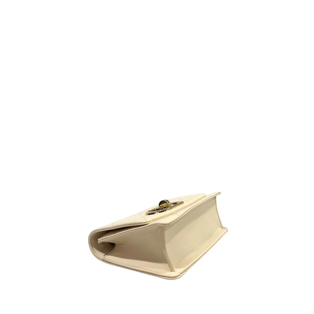 Mini 2-in-1 Shoulder & Crossbody Handbag by Twinset for women in polyurethane beige & gold features a versatile chic silhouette, meticulously detailed with a secure turn-lock, ample , and versatile crossbody-strap & shoulder-strap.