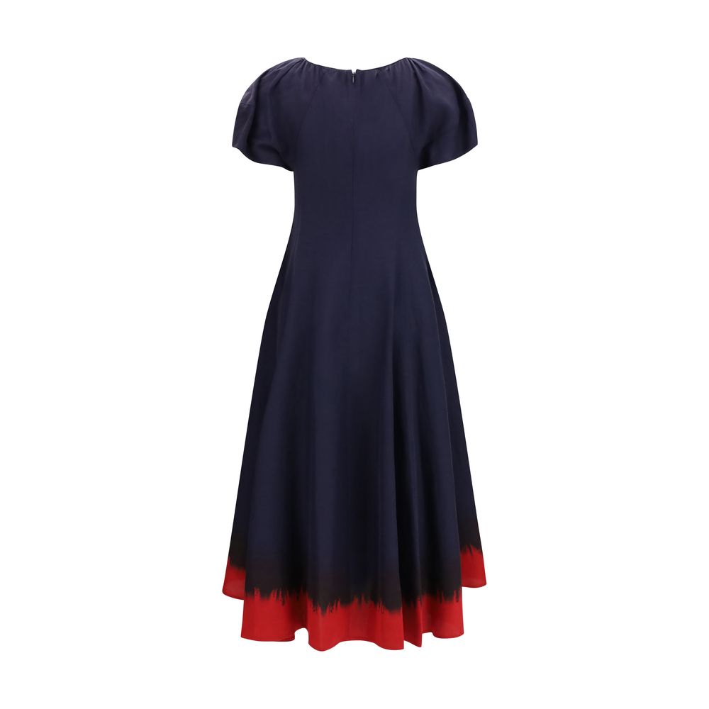 Dress by Tory Burch for women in linen & viscose blue showcases a striking silhouette, elegantly detailed with a , refined round neckline, and a striking midi for a striking finish.