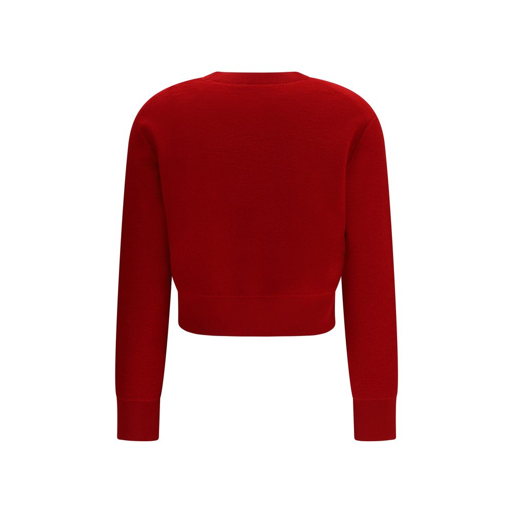 Sweatshirt by Tory Burch for women in wool & polyester multicolor features an provocated silhouette, detailed with a provocated and a refined crew neckline for a sophisticated aesthetic.