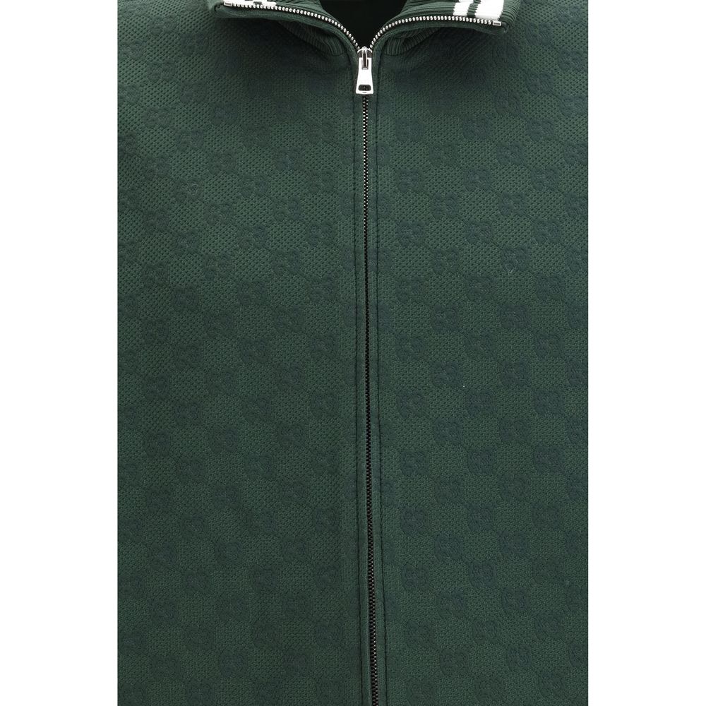 Windbreaker Jacket by Gucci for men in stretch polyamide bicolour & patterned presents a resilient silhouette, artfully detailed with a sophisticated and functional pockets & windproof for a resilient finish.