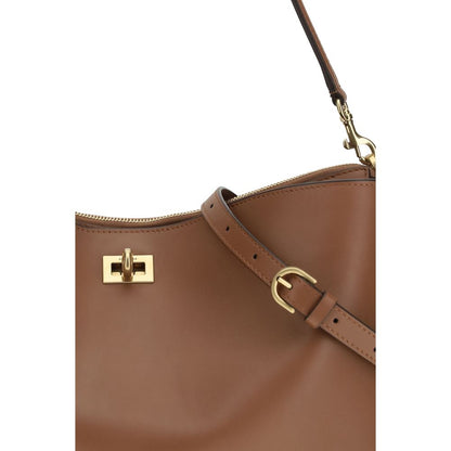 Large Shoulder Bag by Balenciaga for women in bos taurus calf leather beige & gold features a distinguished silhouette, showcasing a secure zipper & turn-lock and distinguished external-pockets with versatile shoulder-strap & handle for a distinguished finish.