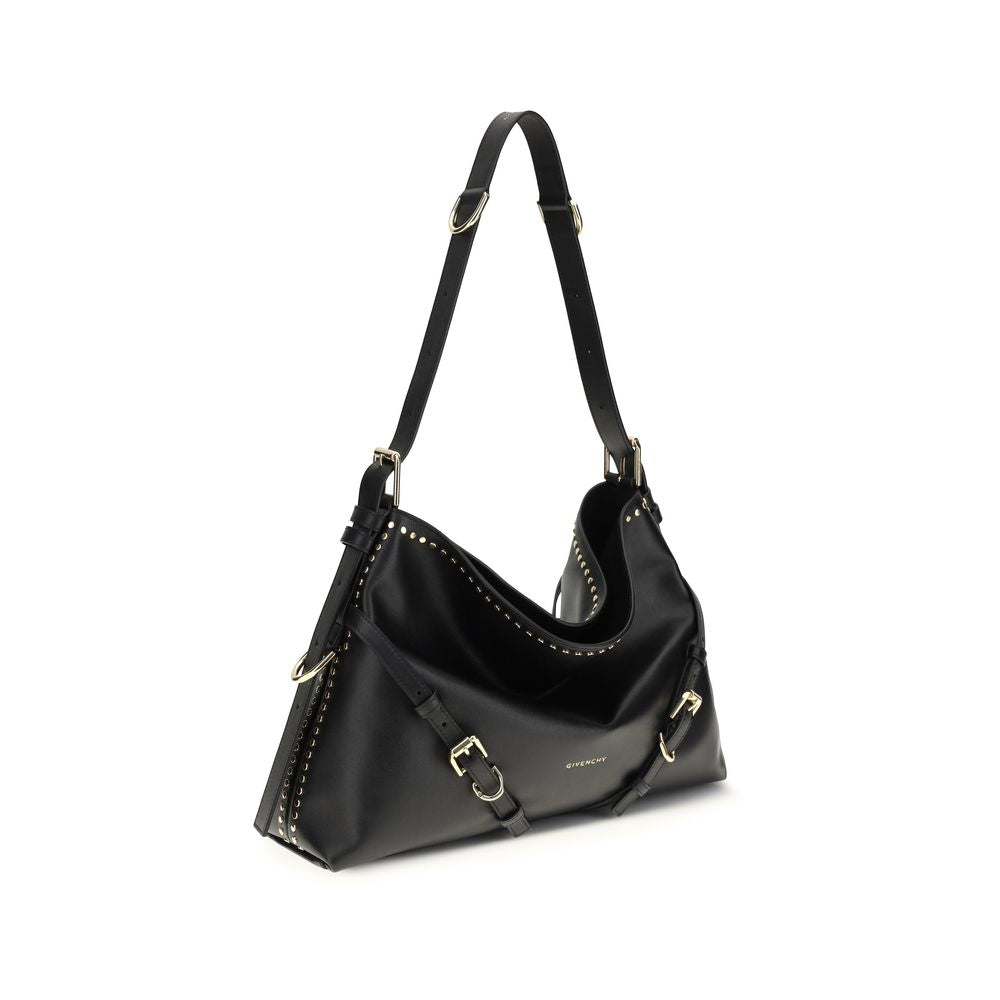 Large Shoulder Handbag by Givenchy for women in bos taurus calfskin leather black, gold & signature features a refined silhouette, showcasing a secure zipper & buckle, organized , and versatile shoulder-strap & adjustable-strap for a refined finish.
