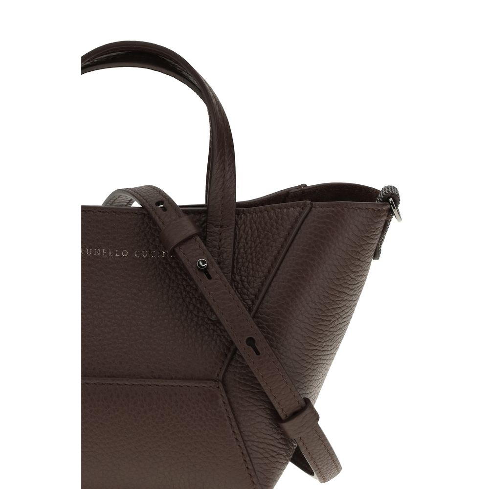 Shoulder Bag by Brunello Cucinelli for women in bos taurus calf leather bordeaux & monogram features an effortlessly chic silhouette with a secure magnetic & button, ample , and versatile shoulder-strap, handle & adjustable-strap for effortlessly chic everyday luxury.