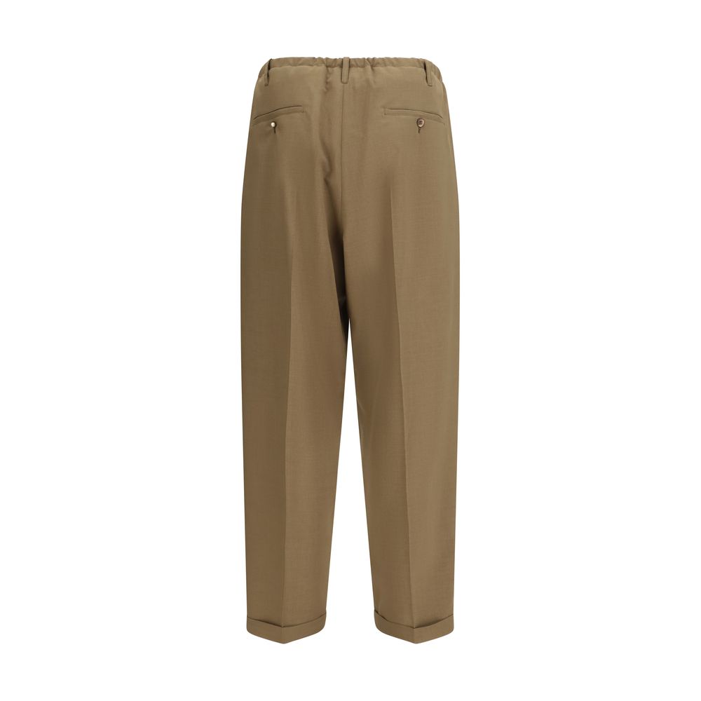 Casual Pants by Magliano for men in polyester beige & pearl presents a refined pantology silhouette, artfully defined by a refined pantology regular-fit, long, and a sophisticated .