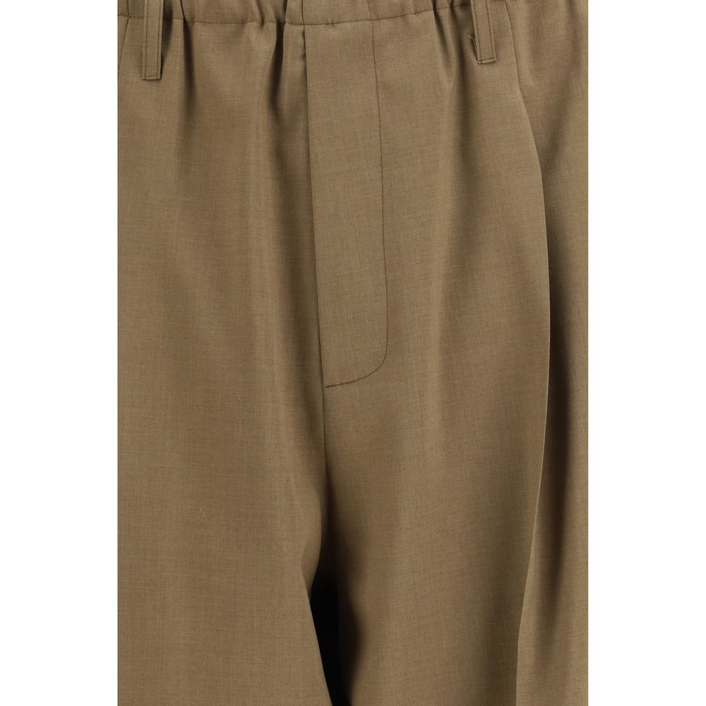 Casual Pants by Magliano for men in polyester beige & pearl features a polished silhouette with a polished regular-fit, reaching a polished long and finished with a polished .