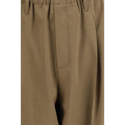 Casual Pants by Magliano for men in polyester beige & pearl features a polished silhouette with a polished regular-fit, reaching a polished long and finished with a polished .