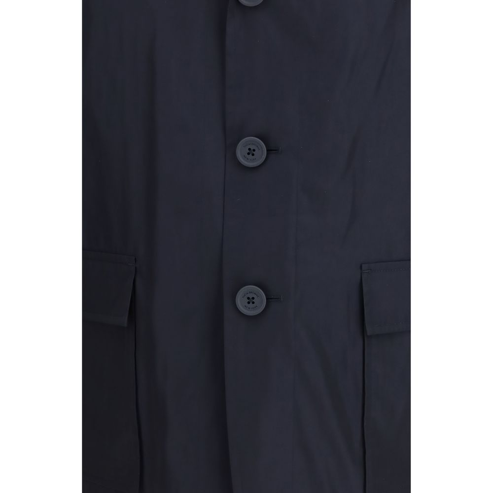 Overcoat by Thom Browne for men in polyester blue, signature & print showcases a enveloping silhouette, detailed with distinctive lightweight & pockets and a enveloping .