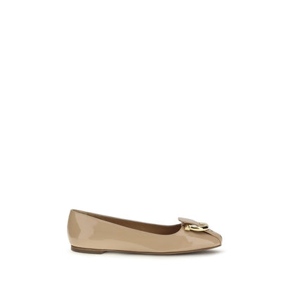 Ballet Flat Shoes by Ferragamo for women in bos taurus calf leather beige presents a effortless chic silhouette, showcasing the Gancini Women's Bos Taurus Calf Leather Ballet Flat Shoes design with a effortless chic and for a sophisticated look.