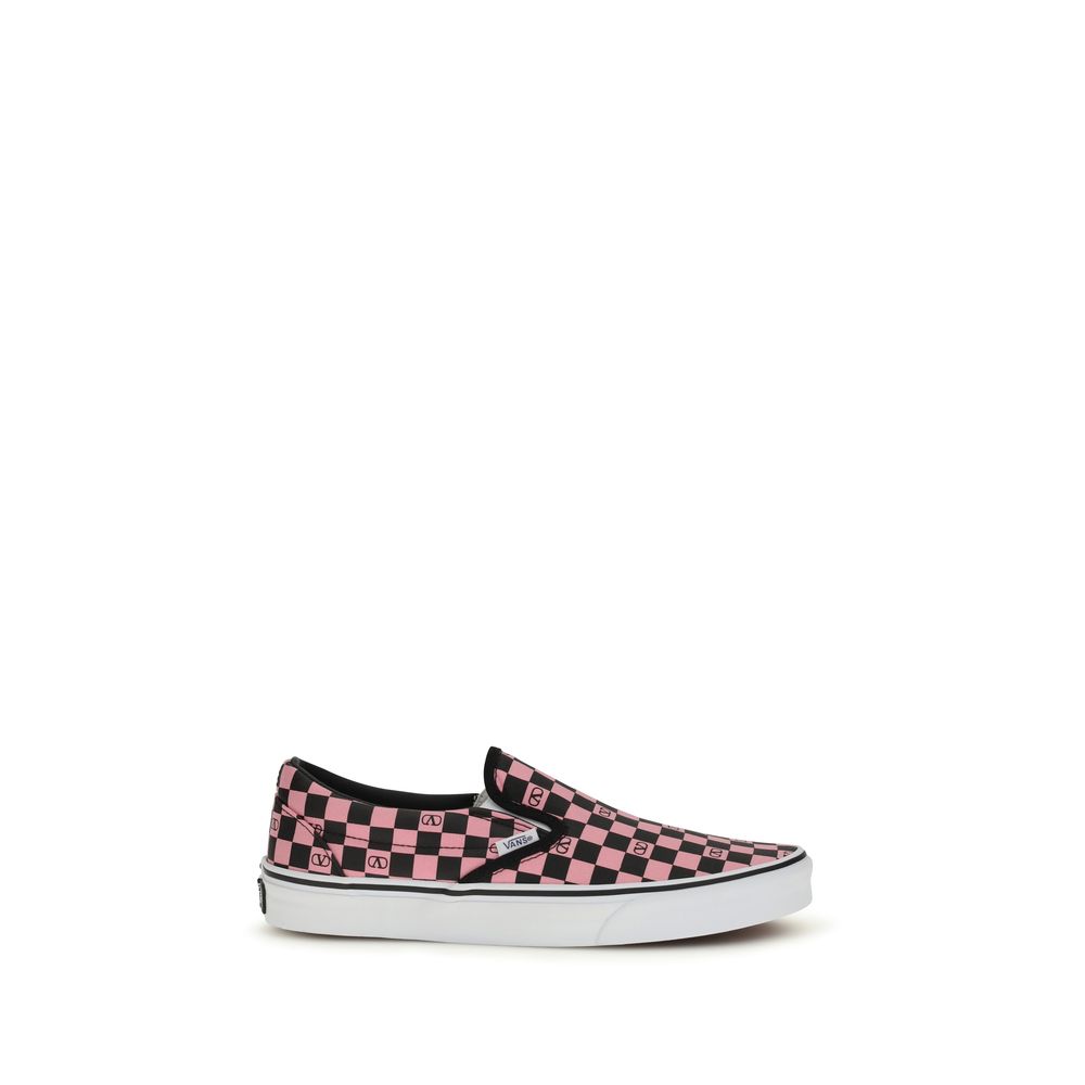Sneakers by Valentino Garavani for men in cotton & rubber multicolor & print presents a sumptuous silhouette, artfully capturing the essence of the Men's Low Top Slip On Cotton & Rubber Sneakers with its sumptuous low-top slip-on style design.