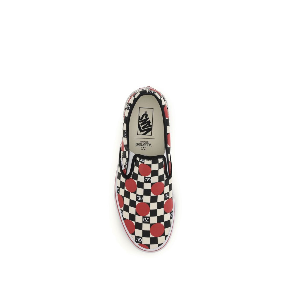 Sneakers by Valentino Garavani for men in cotton & rubber multicolor, signature & print features a chic design, perfectly showcasing the chic low-top slip-on style of this Men's Low Top Slip On Cotton & Rubber Sneakers.