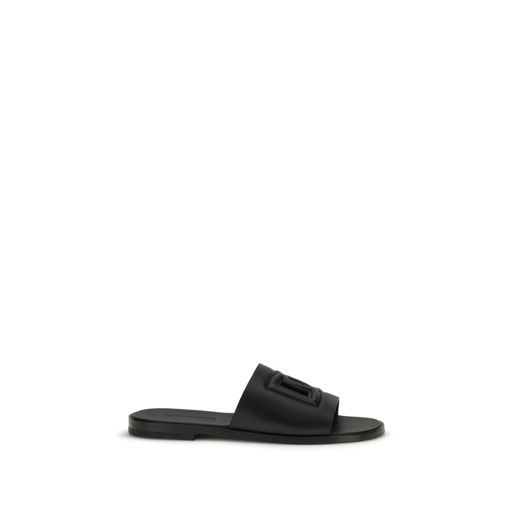 Flat Sandals by Dolce & Gabbana for men in bos taurus calf leather black showcases a sculptural silhouette as Men's Bos Taurus Calf Leather Flat Sandals, defined by a sculptural flat and sculptural open toe style for a sculptural look.