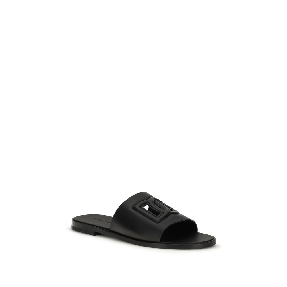 Flat Sandals by Dolce & Gabbana for men in bos taurus calf leather and black presents a captivating silhouette, showcasing the signature style of the Men's Bos Taurus Calf Leather Flat Sandals with a captivating flat and captivating open toe style.