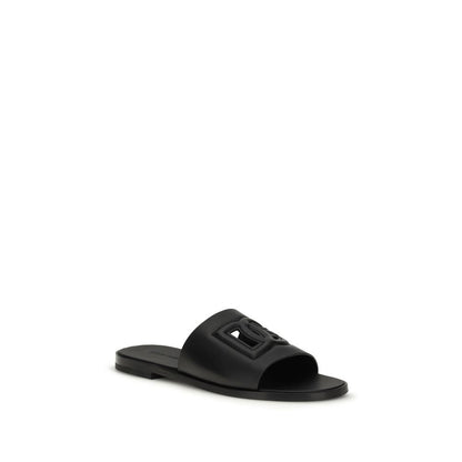 Flat Sandals by Dolce & Gabbana for men in bos taurus calf leather and black presents a captivating silhouette, showcasing the signature style of the Men's Bos Taurus Calf Leather Flat Sandals with a captivating flat and captivating open toe style.