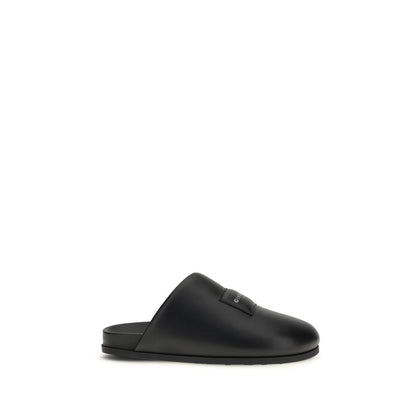 Flat Mule Mules Shoes by Givenchy for men in bos taurus calf & lambskin leather black & signature features an effortless chic silhouette, showcasing the Men's Bos Taurus Calf & Lambskin Leather Flat Mule Mules Shoes design with an effortless chic flat and a for a effortless chic look.