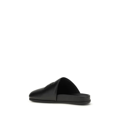 Flat Mule Mules Shoes by Givenchy for men in bos taurus calf & lambskin leather black & signature features an dynamic silhouette from the Men's Bos Taurus Calf & Lambskin Leather Flat Mule Mules Shoes collection, defined by a dynamic and flat for a dynamic look.