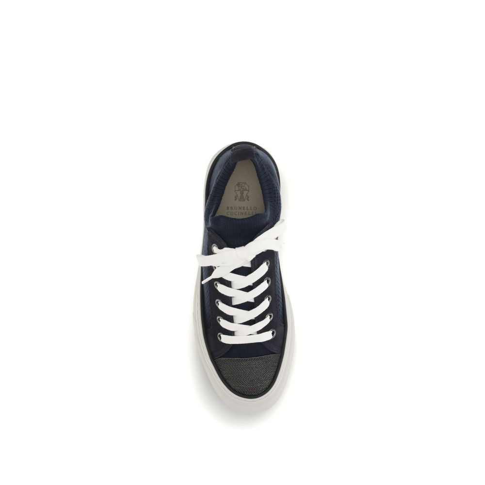 Sneakers by Brunello Cucinelli for women in bos taurus suede calfskin leather & cotton black presents a sumptuous silhouette, artfully capturing the essence of the Women's Low Top Bos Taurus Suede Calfskin Leather & Cotton Sneakers with its sumptuous low-top style design.