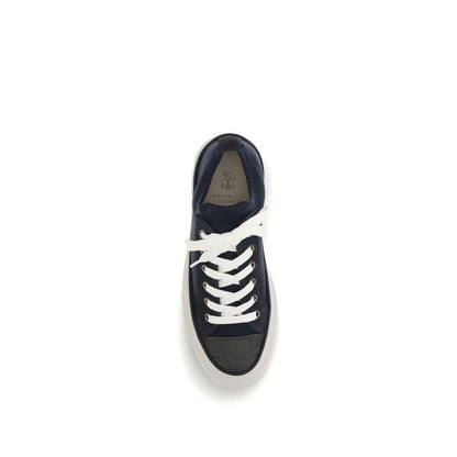 Sneakers by Brunello Cucinelli for women in bos taurus suede calfskin leather & cotton black presents a sumptuous silhouette, artfully capturing the essence of the Women's Low Top Bos Taurus Suede Calfskin Leather & Cotton Sneakers with its sumptuous low-top style design.