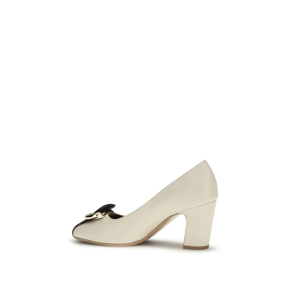 This High-Heel Pumps Heels by Ferragamo for women in bos taurus calf leather beige presents a effortlessly chic silhouette from the Gancini Women's Bos Taurus Calf Leather High-Heel Pumps Heels collection, featuring a effortlessly chic high-heel block-heel and effortlessly chic .