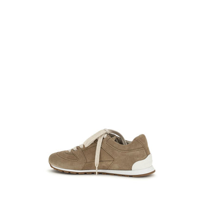 Sneakers by Brunello Cucinelli for women in bos taurus calf suede leather beige presents a impeccable silhouette as Women's Low Top Bos Taurus Calf Suede Leather Sneakers, expertly defined by a impeccable low-top style for a impeccable, high-fashion look.