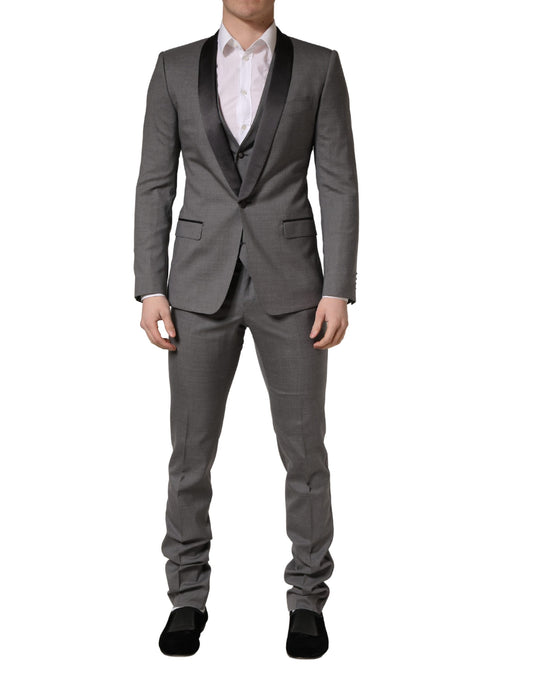 Pant Suit by Dolce & Gabbana for men in virgin wool cupro & silk gray presents a nuanced silhouette, showcasing a nuanced single-breasted neckline and nuanced slim for an elevated aesthetic.