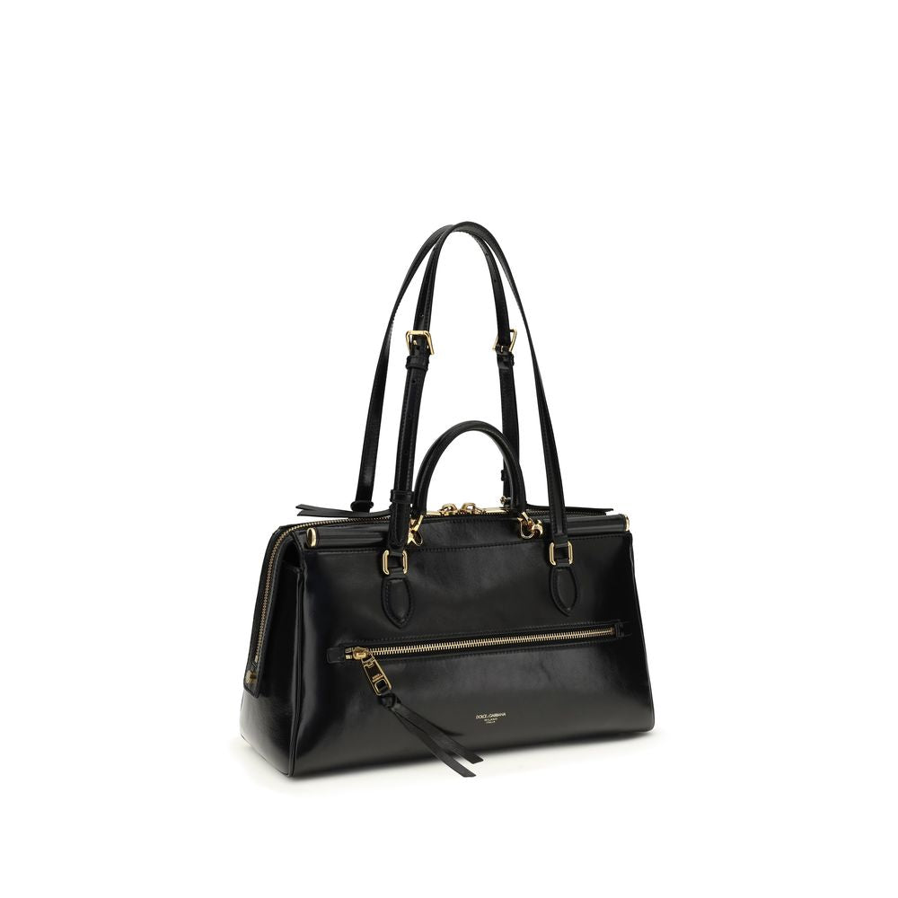 Medium Shoulder Bag by Dolce & Gabbana for women in pvc bio acetate & bos taurus calf leather black, natural & signature features a distinguished silhouette, showcasing a secure zipper and distinguished with versatile shoulder-strap, handle & adjustable-strap for a distinguished finish.