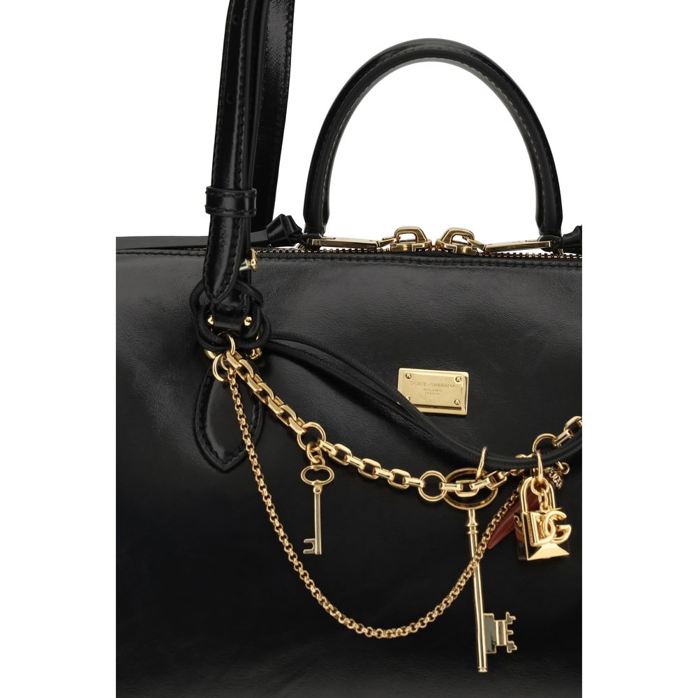 Medium Shoulder Bag by Dolce & Gabbana for women in pvc bio acetate & bos taurus calf leather black, natural & signature features a enviable silhouette, showcasing a secure zipper, ample , and enviable shoulder-strap, handle & adjustable-strap for a enviable finish.