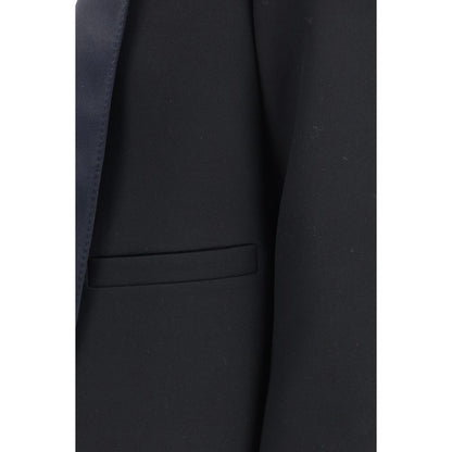 Overcoat by Tom Ford for women in wool black presents a luxurious silhouette, showcasing a luxurious and sophisticated pockets for a premium, luxurious look.