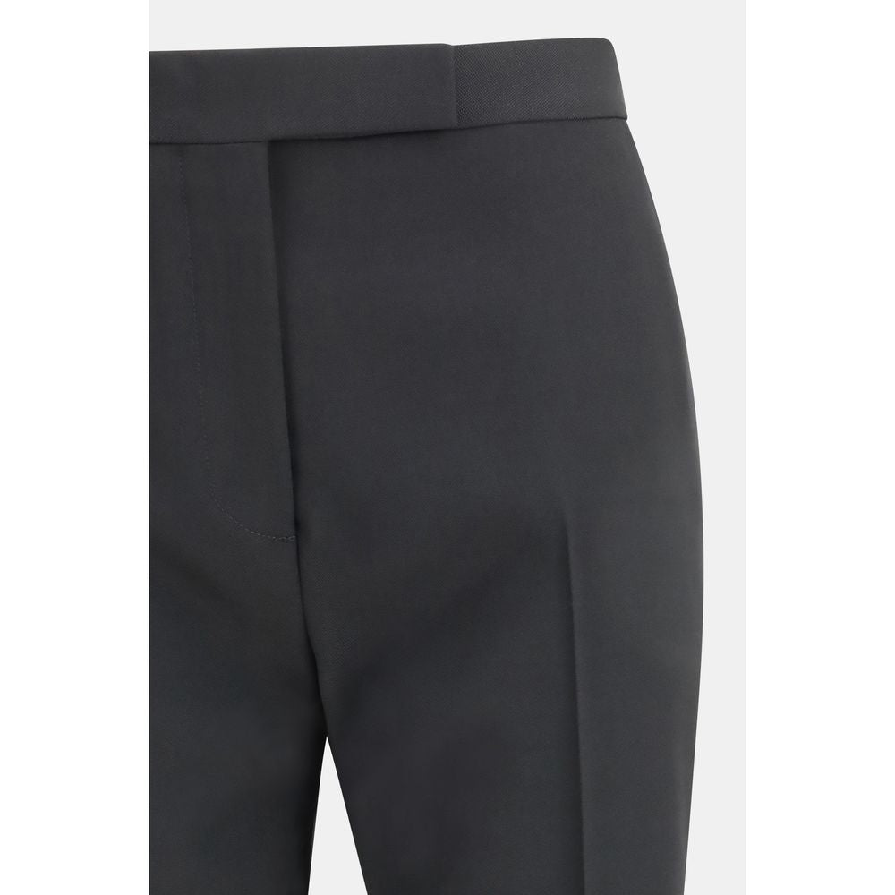 Trousers by Tom Ford for women in wool bicolour & black presents a smart silhouette, meticulously detailed with a smart straight-leg & regular-fit, a smart long, and a smart .