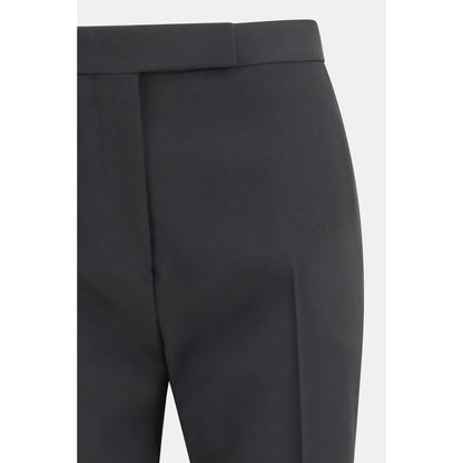 Trousers by Tom Ford for women in wool bicolour & black presents a smart silhouette, meticulously detailed with a smart straight-leg & regular-fit, a smart long, and a smart .