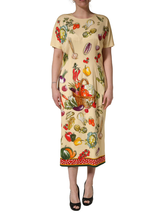 Dress by Dolce & Gabbana for women in calf leather & silk beige & patterned presents a sinuous silhouette, showcasing a sophisticated and short-sleeve detailed with a sinuous midi for a refined finish.