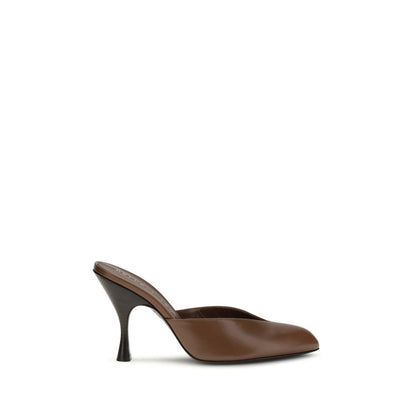 Mules Flat Shoes by Herbert Levine for women in bos taurus calf leather brown features an statuesque silhouette from the Women's Bos Taurus Calf Leather Mules Flat Shoes collection, showcasing a and a statuesque for a statuesque look.