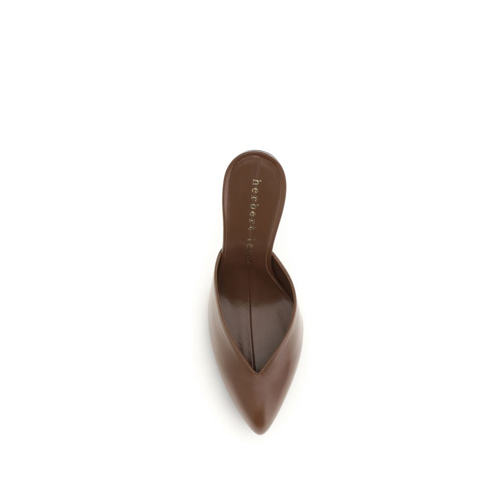 Mules Flat Shoes by Herbert Levine for women in bos taurus calf leather brown showcases a enchanting silhouette as part of the Women's Bos Taurus Calf Leather Mules Flat Shoes collection, defined by a enchanting and for a enchanting look.