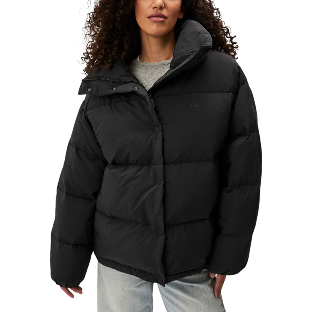 Overcoat by Calvin Klein Jeans for women in polyester black features an satoral silhouette, showcasing a sophisticated high-collar neckline and satoral for a premium, timeless look.