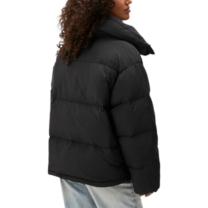 Overcoat by Calvin Klein Jeans for women in polyester black showcases a architectural silhouette, artfully detailed with a distinctive and functional for a architectural finish.