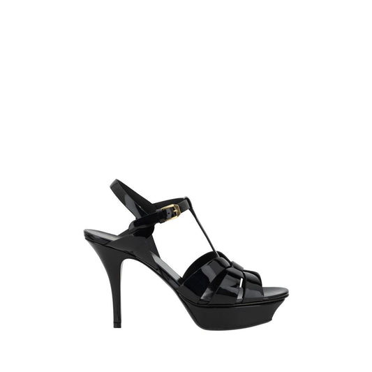 Platform Stiletto Ankle Strap Sandals by Saint Laurent for women in bos taurus calf patent leather and black presents a captivating silhouette, showcasing the signature style of the Women's Bos Taurus Calf Patent Leather Platform Stiletto Ankle Strap Sandals with a captivating stiletto platform and captivating .