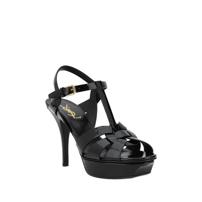 Platform Stiletto Ankle Strap Sandals by Saint Laurent for women in bos taurus calf patent leather black features an statuesque Women's Bos Taurus Calf Patent Leather Platform Stiletto Ankle Strap Sandals silhouette with a refined stiletto platform and elegant .