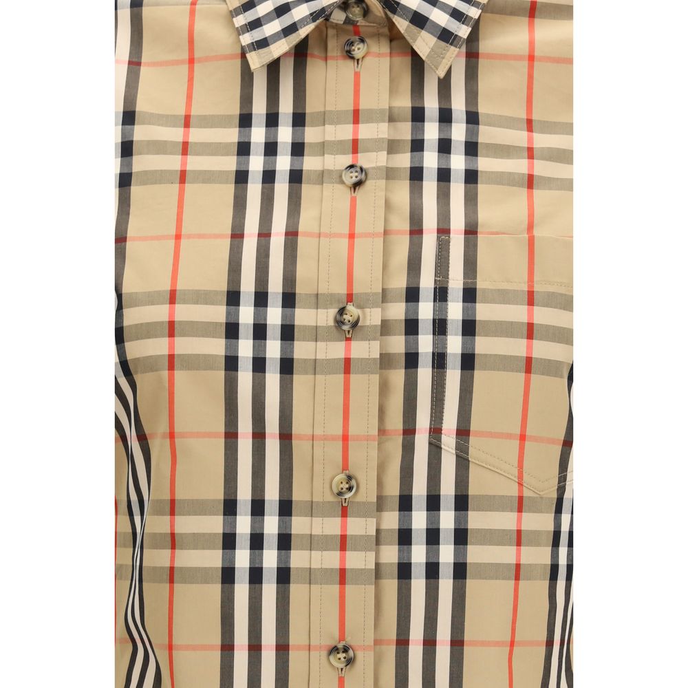 Shirt by Burberry for women in cotton multicolor & patterned showcases a sharp silhouette, elegantly detailed with a sharp and sharp .