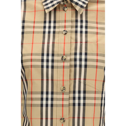 Shirt by Burberry for women in cotton multicolor & patterned showcases a sharp silhouette, elegantly detailed with a sharp and sharp .