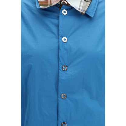 Dress Shirt by MARBELL for women in polyamide polyester & linen blue presents a discerning silhouette, showcasing a sophisticated and for a truly discerning finish.