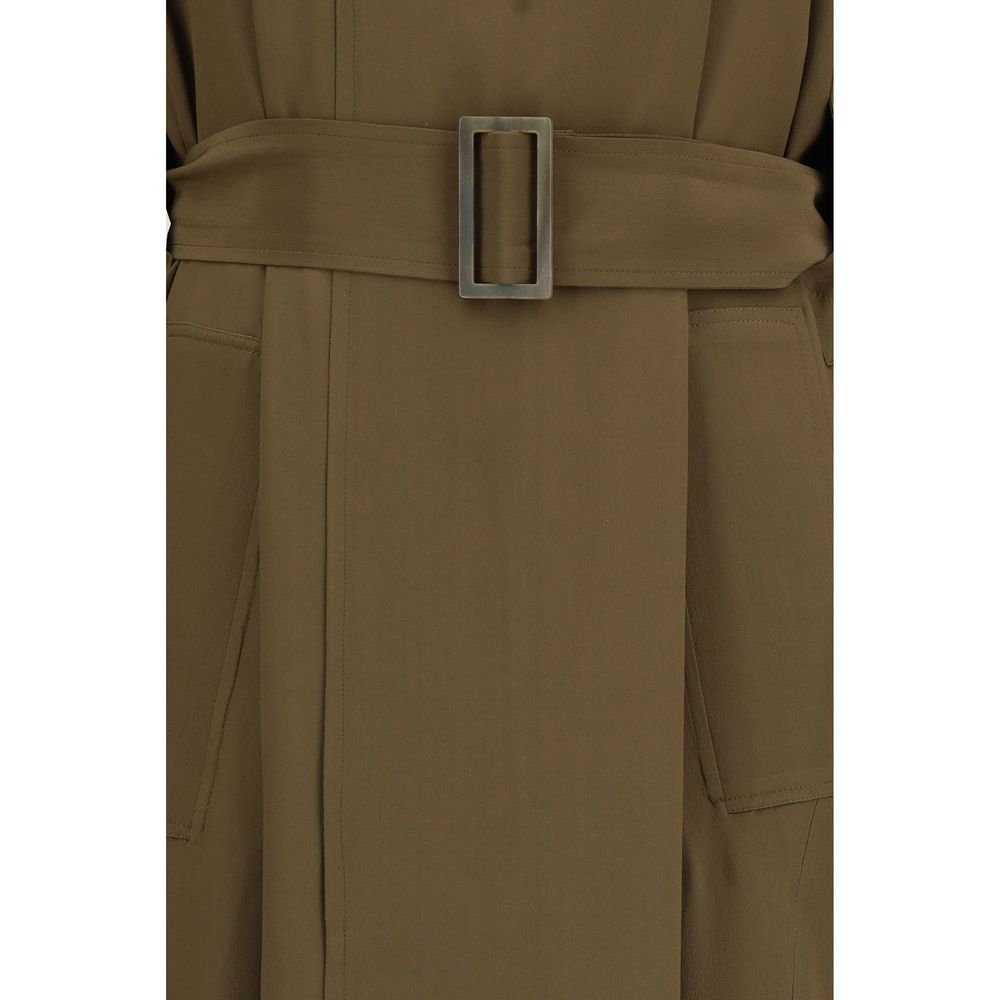 Trench Coat by Petar Petrov for women in silk bicolour presents an sculptural silhouette, artfully detailed with a sculptural and functional pockets & insulated for a truly sculptural finish.