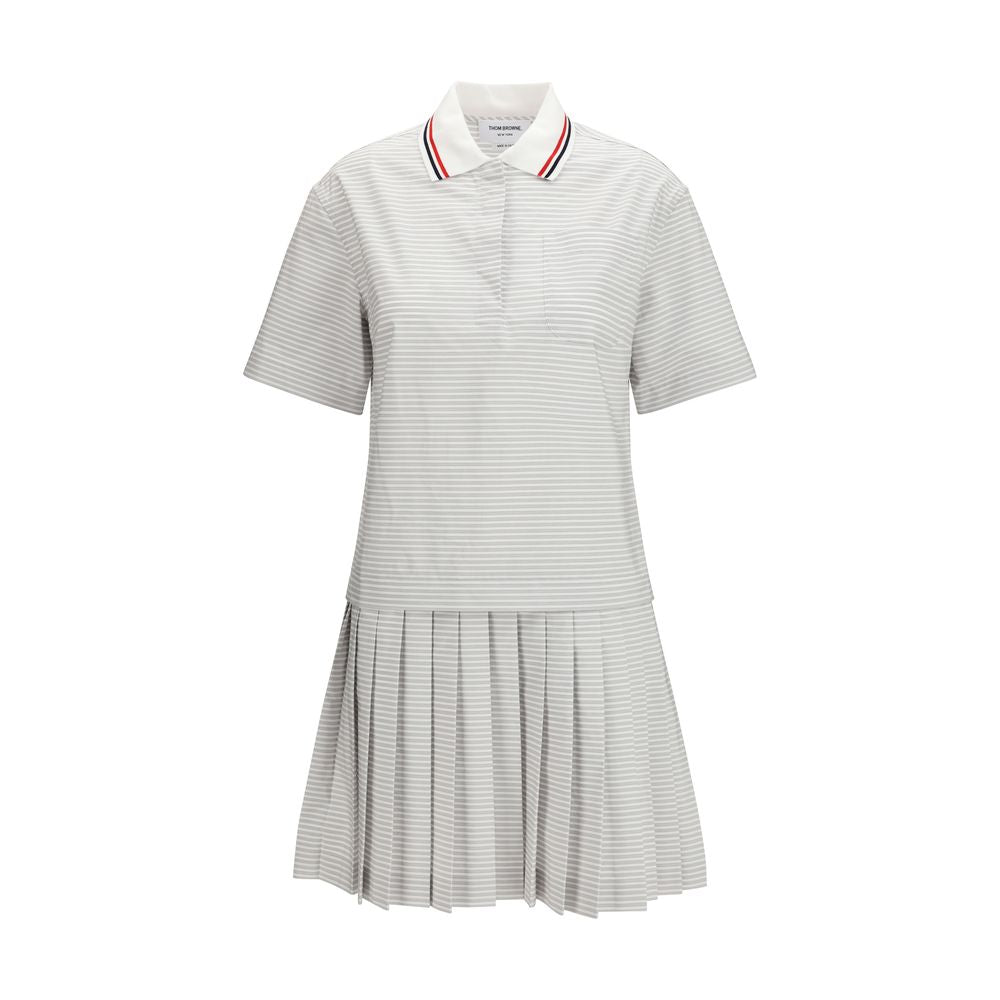 Dress by Thom Browne for women in cotton gray, patterned & striped showcases a striking silhouette, elegantly detailed with a short-sleeve, refined , and a striking for a striking finish.