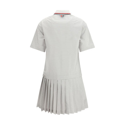 Dress by Thom Browne for women in cotton gray, patterned & striped presents a sinuous silhouette, showcasing a sophisticated and detailed with a sinuous for a refined finish.