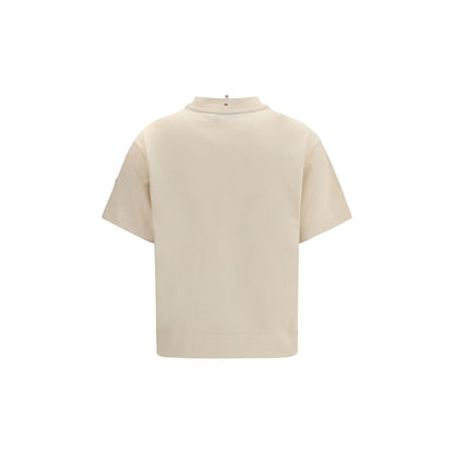 Activewear T-Shirt by Moncler Grenoble for women in cotton beige & print features an athletic silhouette with sleeves and a crew neckline neckline, enhanced by high-performance .