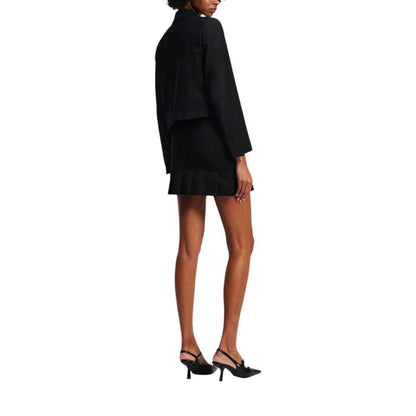 Skirt by Karl Lagerfeld for women in stretch polyester cotton black features an tailored silhouette, artfully capturing the essence of Women's Mini Pleated Stretch Polyester Cotton Skirt in a sophisticated mini.