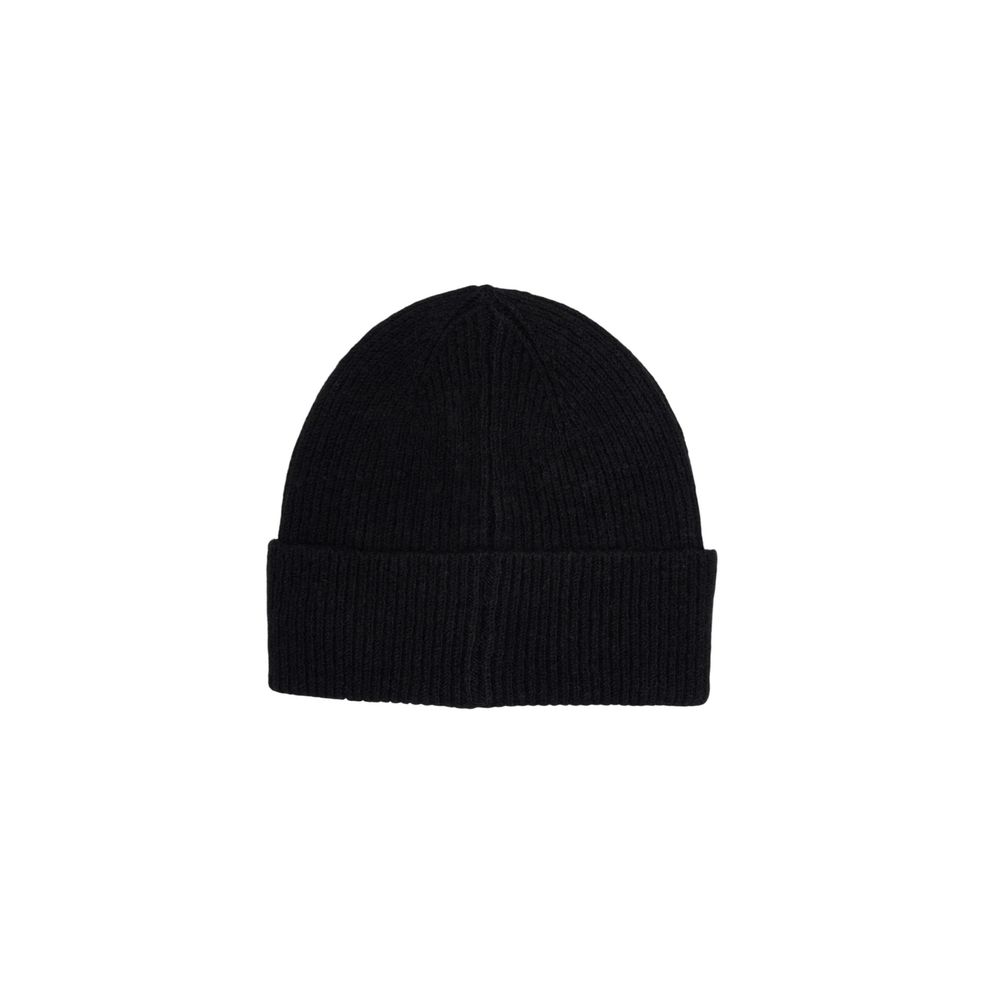 Beanie Hat by Liu Jo for women in poly wool black features a distinguished knit construction, showcasing the sophisticated silhouette and distinguished finish of the Poly Wool Beanie Hat.